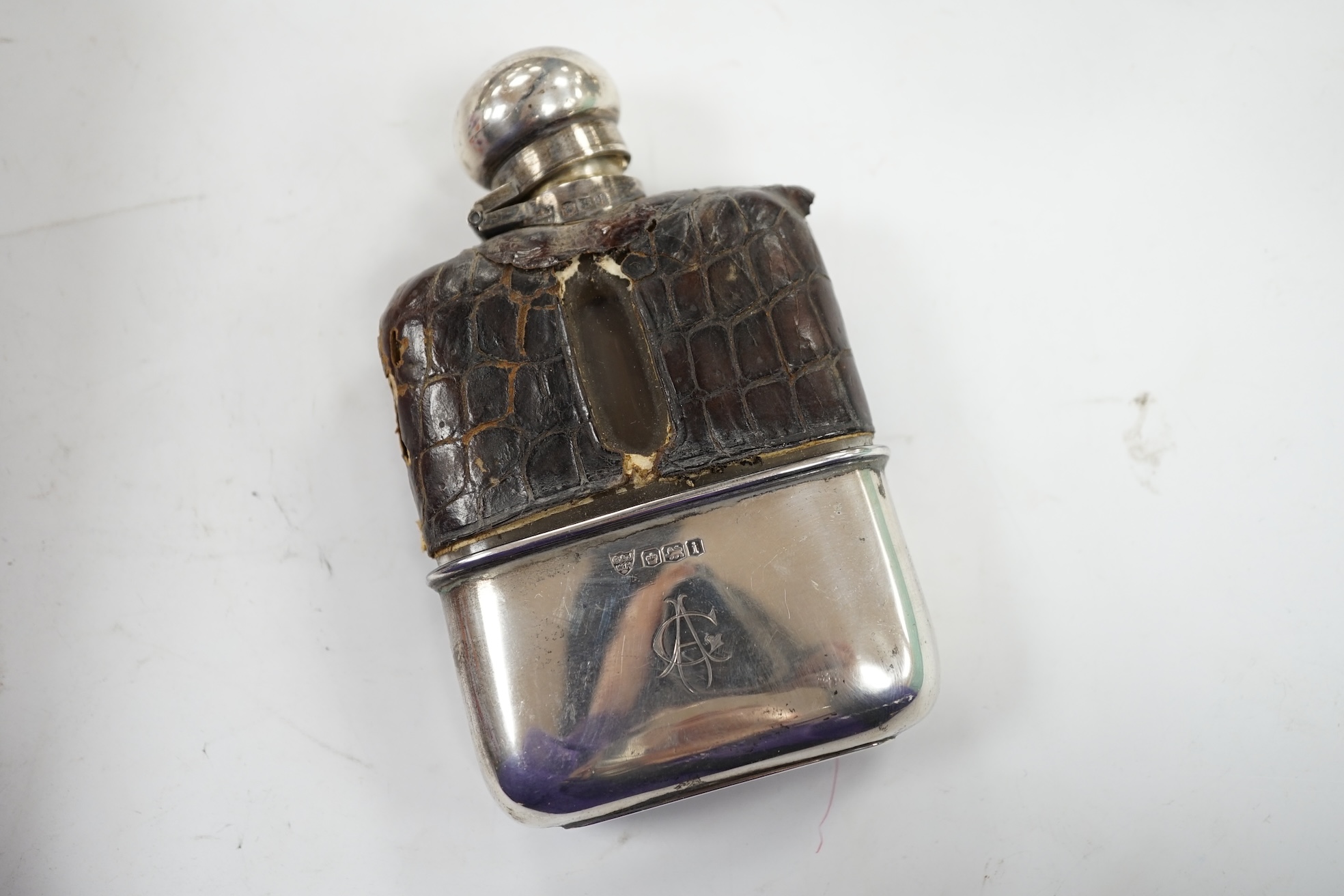 A collection of small silver collectables including a mounted hip flask, five napkin rings, two mounted toilet jars, trinket box, two wine labels, three condiments, a silver collar and a small trophy cup. Condition - poo